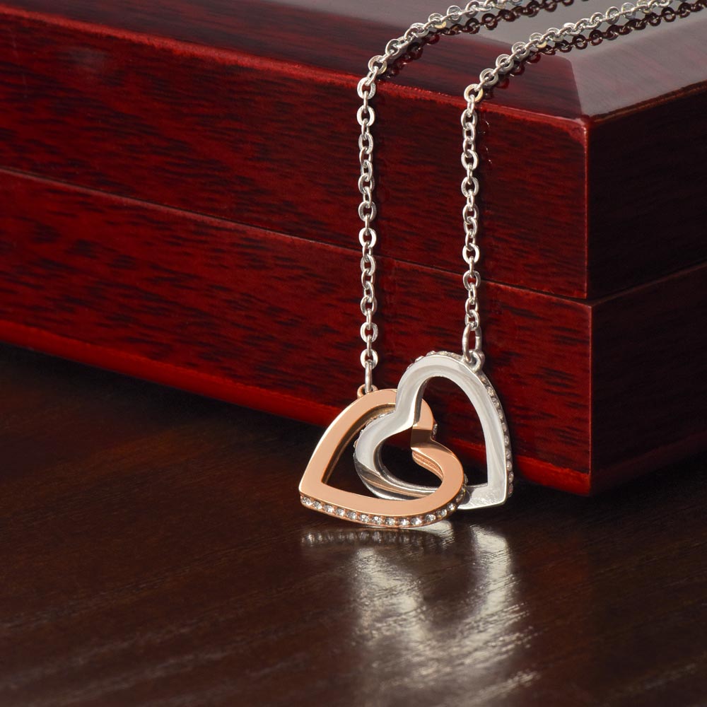 Surgical steel & Rose Gold interlocking hearts necklace