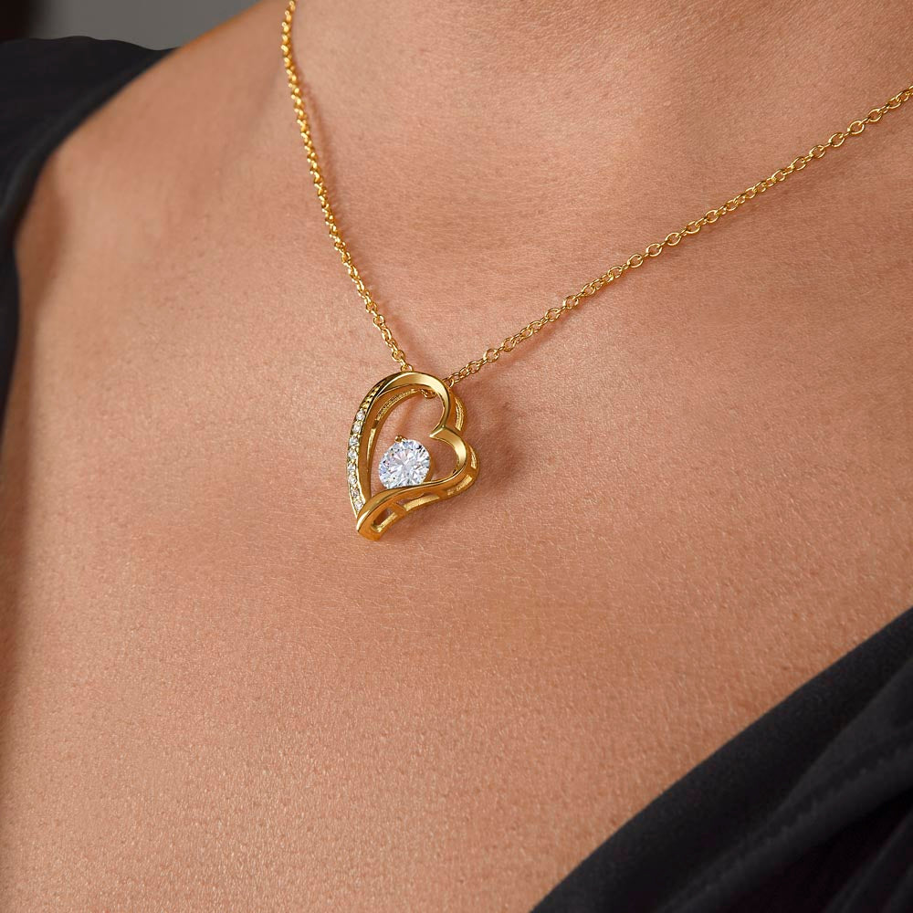 18k yellow gold finish Forever Love Necklace on a model